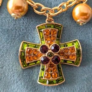 Heidi Daus Gold and Green Ornate Cross Necklace